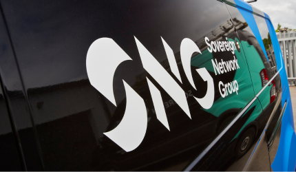 Close up image of the SNG logo on a trades van