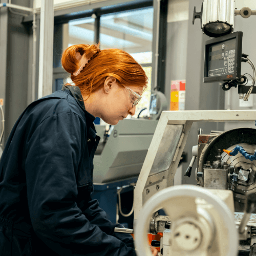Engineering student working on equipment