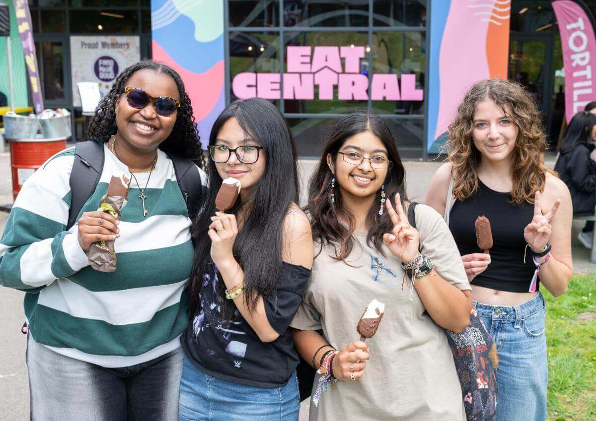Students enjoying icecreams outside of Eat Central.