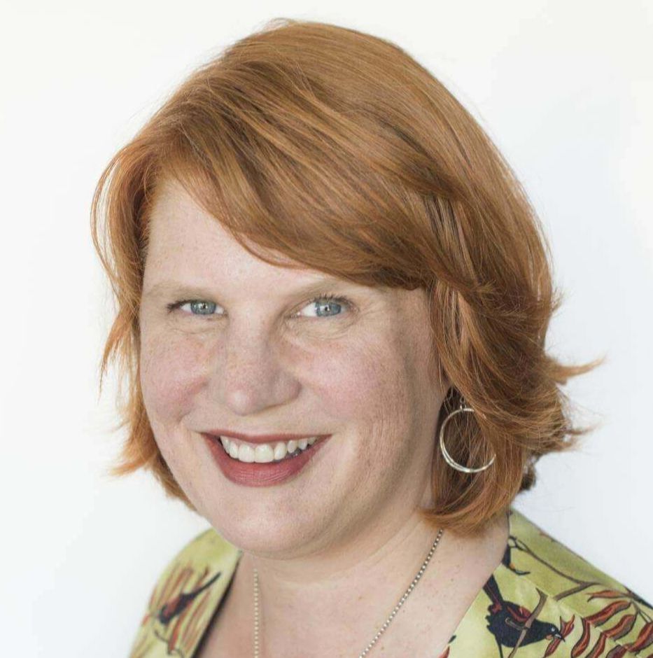 Professor Lynne Murphy smiling warmly at the camera.